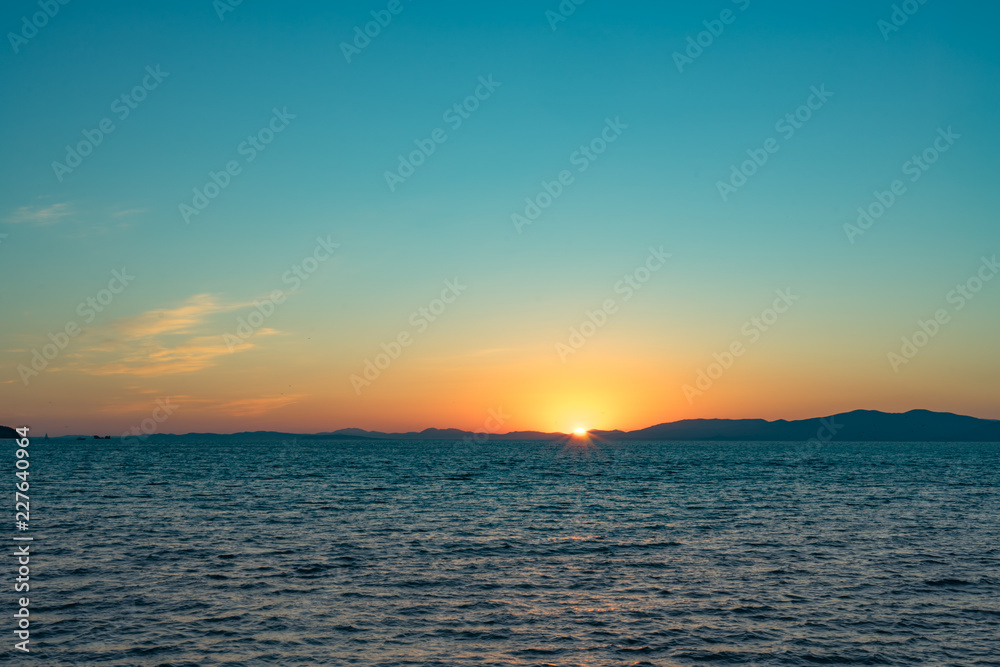 Seascape with sunset views over the Pacific ocean.
