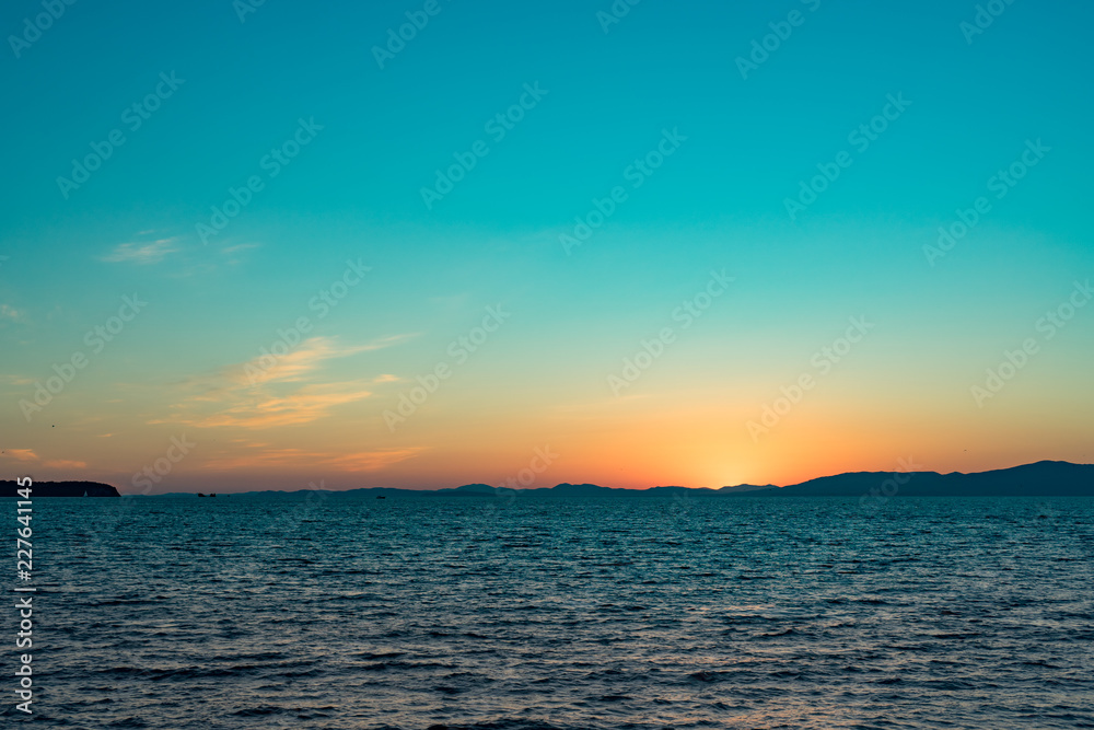 Seascape with sunset views over the Pacific ocean.