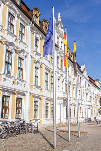 Europe, German and  Saxony-Anhalt flag in front of the state parliament in Magdeburg / Germany photo