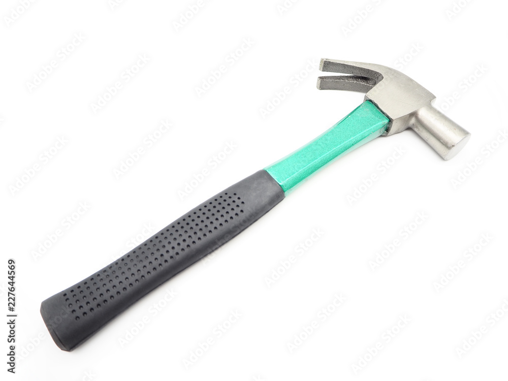 Green iron hammer with rubberized handle isolated on a white background. Green iron hammer with rubberized handle isolated on a white background.