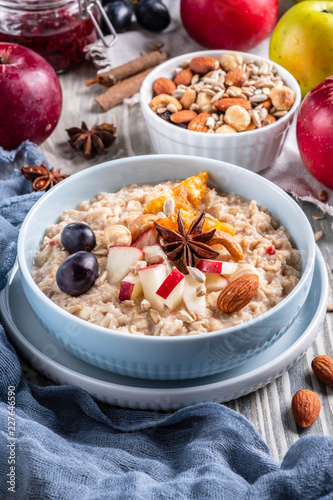 oatmeal with fruit and nuts, healthy breakfast