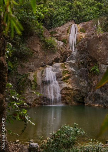 Budlaan waterfalls outdoor activities hiking along a river creek watercourse passing bamboo bridge, series of images in Cebu province
