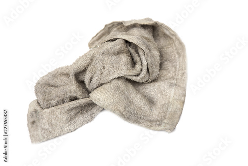 Cloth rag with stains on white background.