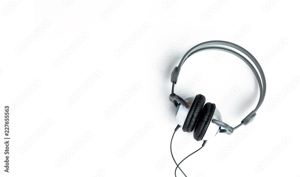 Kids headphones in gray and black on white background. learning foreign languages Kids headphones in gray and black on white background. learning foreign languages