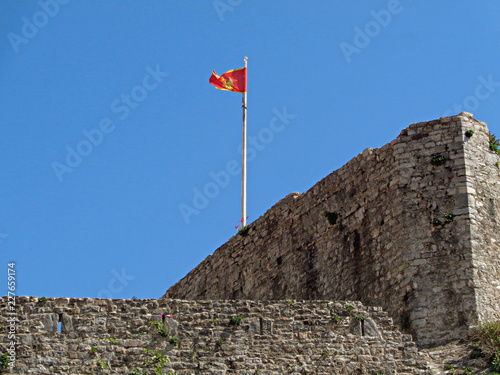 Budva Citadel with the Flag of Montenegro on the top, Budva 's Old Town, Montenegro, Balkans, Europe