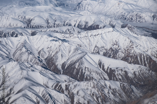 Aerial view lanscape scene of Himalayann range mountain layer with shade and light. photo