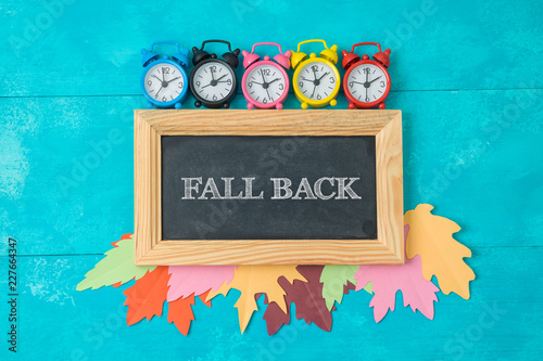 Fall back time change concept. photo
