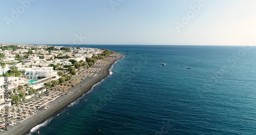 Wallpaper Mural private beach with umbrella on the island of Santorini in aerial view Torontodigital.ca