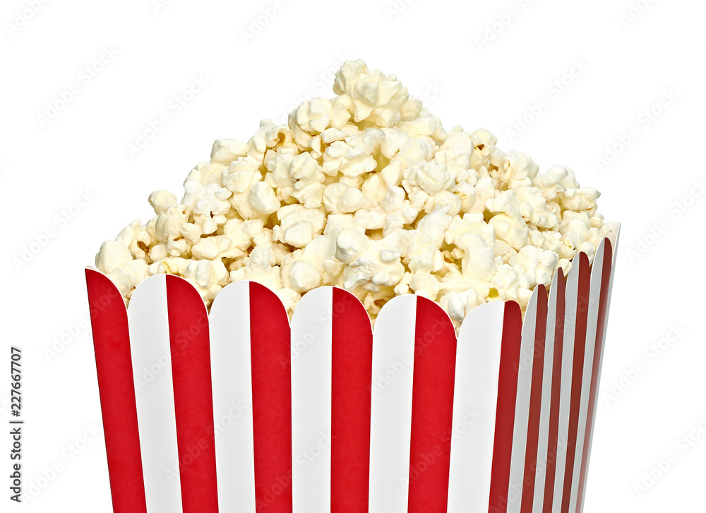 Popcorn in striped paper or carton bucket isolated on white background Popcorn in striped paper or carton bucket isolated on white background