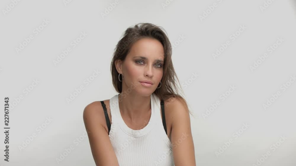 argentine woman studio portrait on white looking at camera and aside argentine woman studio portrait on white looking at camera and aside