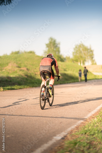 Fototapeta Naklejka Na Ścianę i Meble -  Professional road bicycle racer in action
