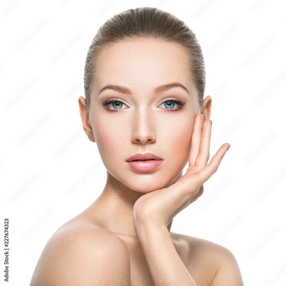Beautiful face of young woman with perfect health  skin