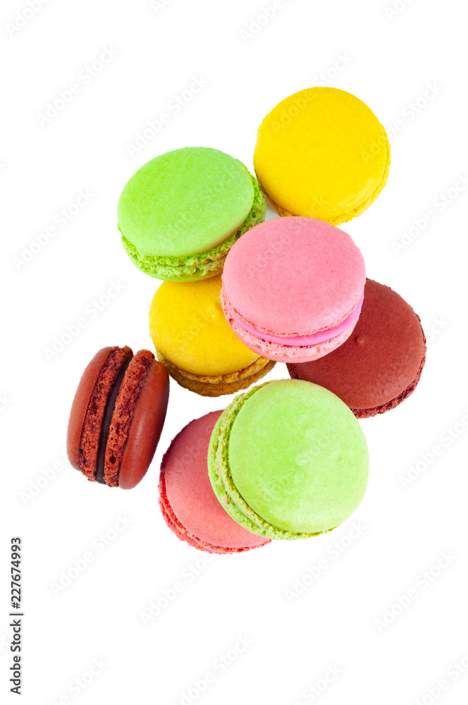 Macaron cakes of different colors isolated on a white background Macaron cakes of different colors isolated on a white background