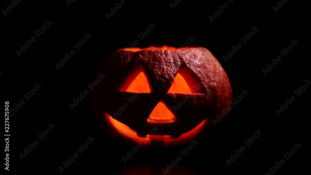 Halloween pumpkin with scary face with with a burning candle. Halloween pumpkin with scary face with with a burning candle.