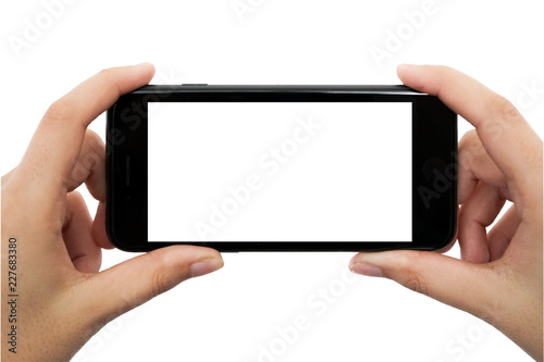 Handy in der Hand vor weißem Hintergrund