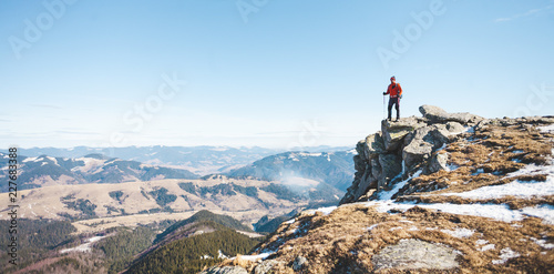 The man on the top of the mountain.