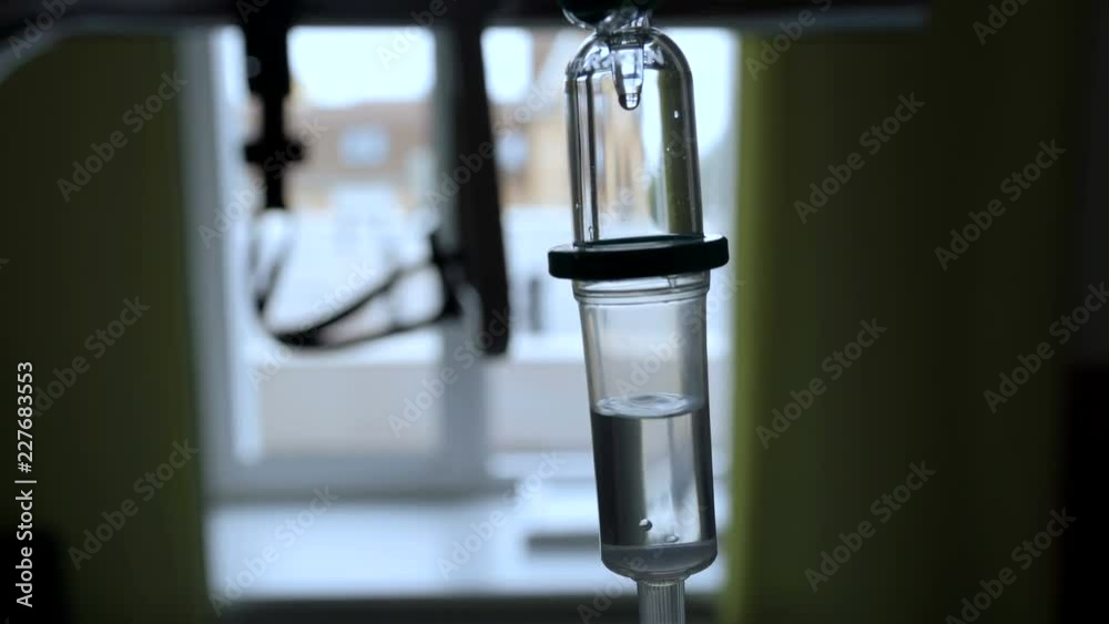 Medical dropper close-up on the background of the window Medical dropper close-up on the background of the window