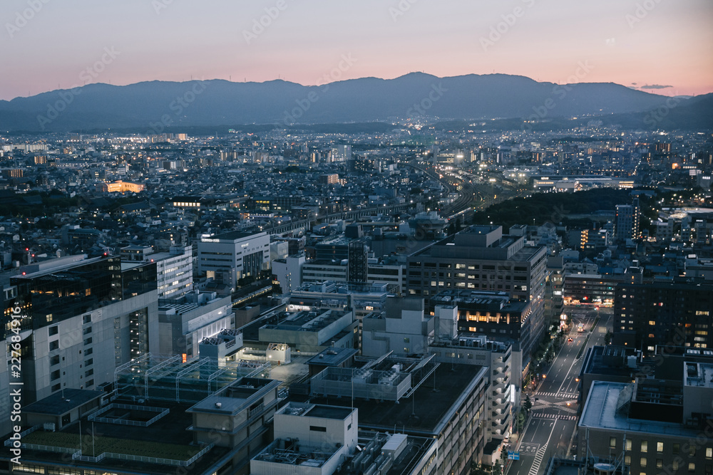 cityscape of Kyoto at night in film vintage style