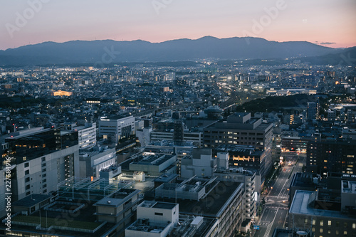 cityscape of Kyoto at night in film vintage style