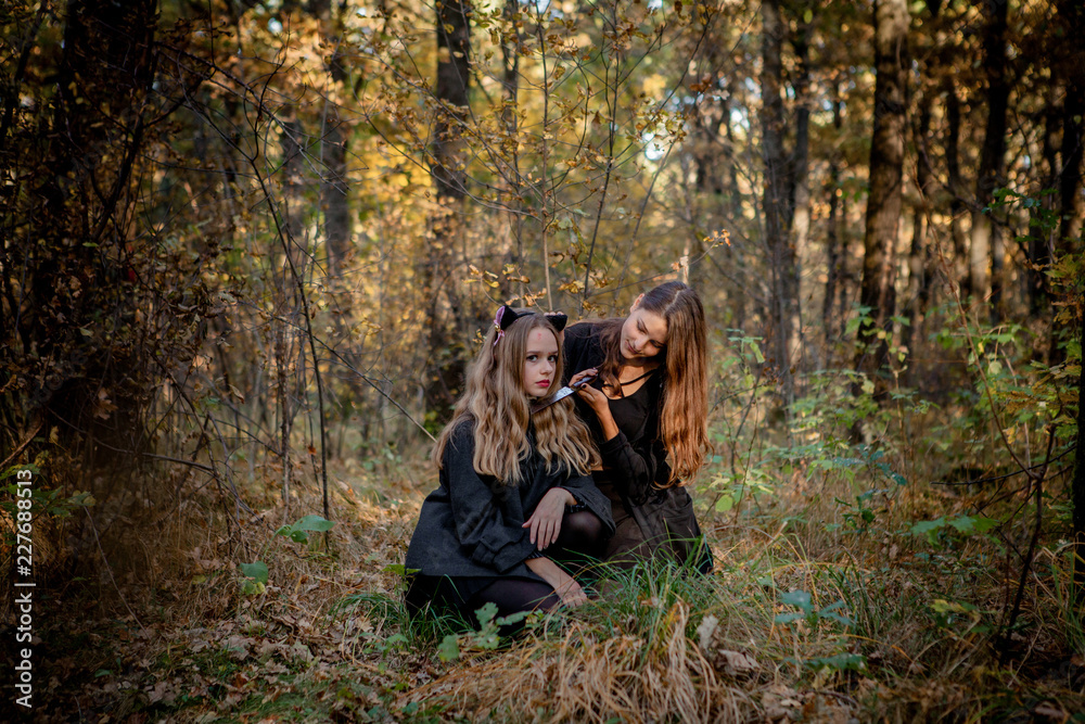 Halloween Maniac and Witch in the Forest Halloween Maniac and Witch in the Forest