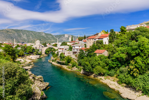 Sightseeing in Bosnia and Herzegovina. The Old Bridge, Stari Most, with emerald river Neretva in Mostar old town.
