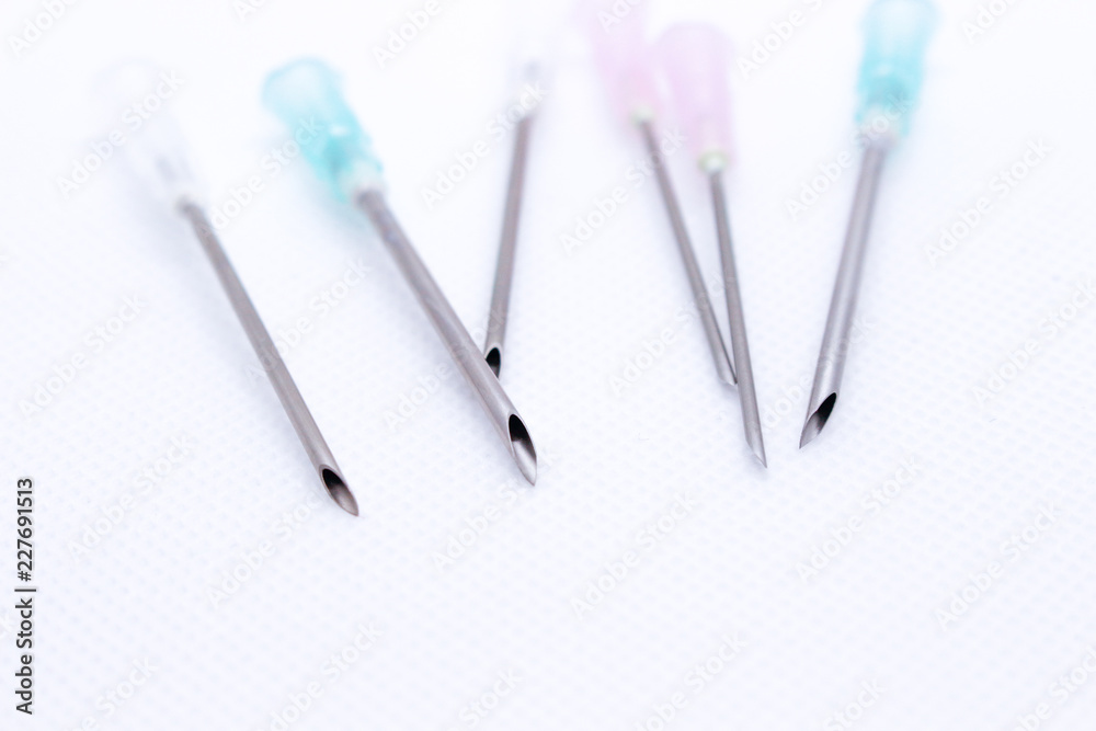 Cannula. Isolated on white of medical needle. Macro shot Cannula. Isolated on white of medical needle. Macro shot