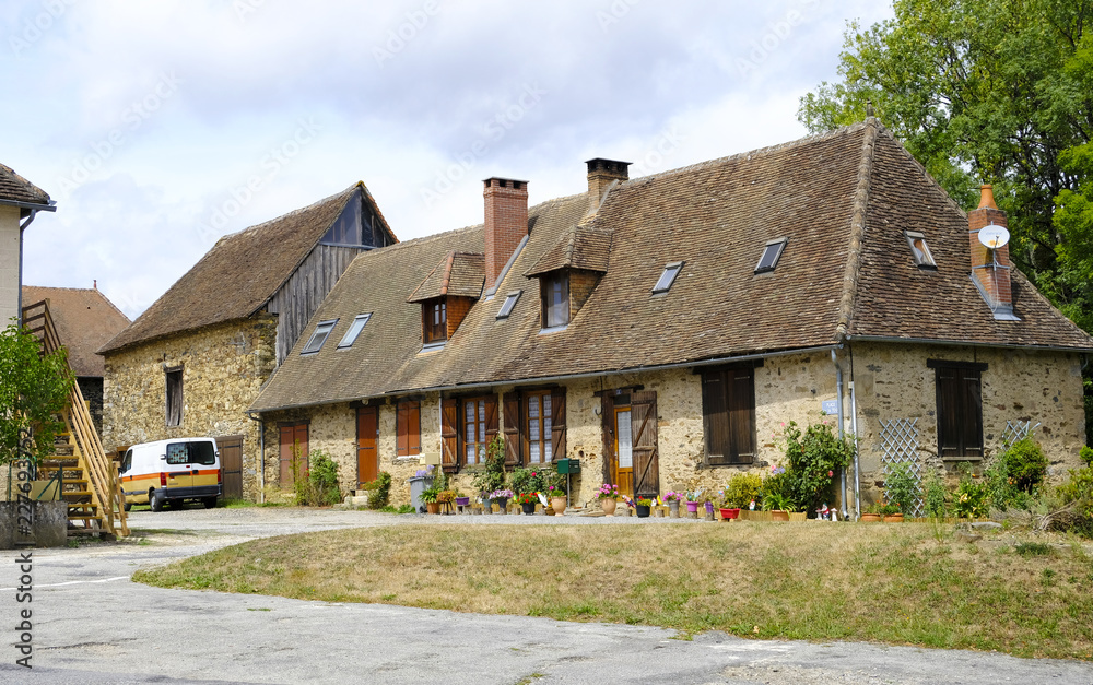 Old beautiful house in Magnac-Bourg. Magnac-Bourg is a commune in the Nouvelle-Aquitaine region in west-central France Old beautiful house in Magnac-Bourg. Magnac-Bourg is a commune in the Nouvelle-Aquitaine region in west-central France