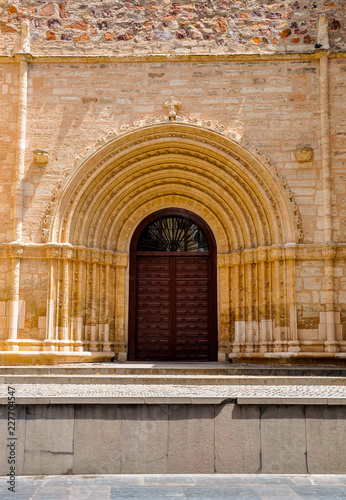 Ancient ornate wooden door of a church in Ciudad Real  Spain.