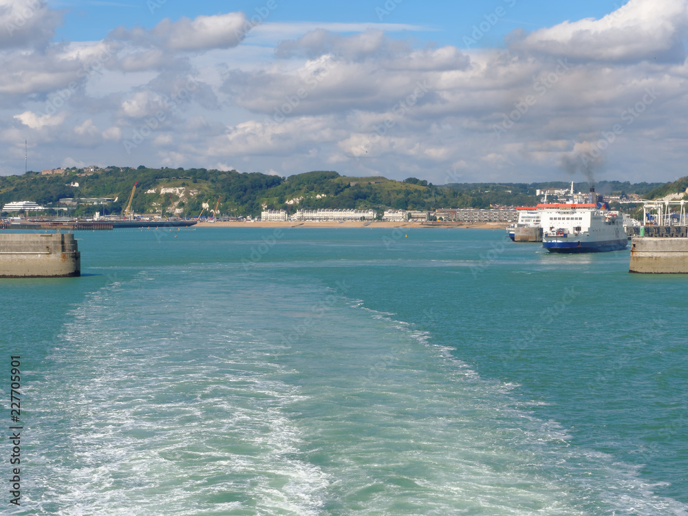 The ferry leaves for a cruise from the port of Dover on a sunny day. The ferry leaves for a cruise from the port of Dover on a sunny day.