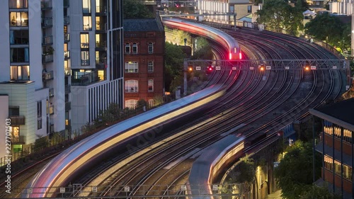 Time-lapse of trains in London UK zooming smoothly across mutliple tracks. photo