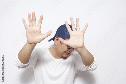 Crying Sad Young Man Showing Surrender Gesture