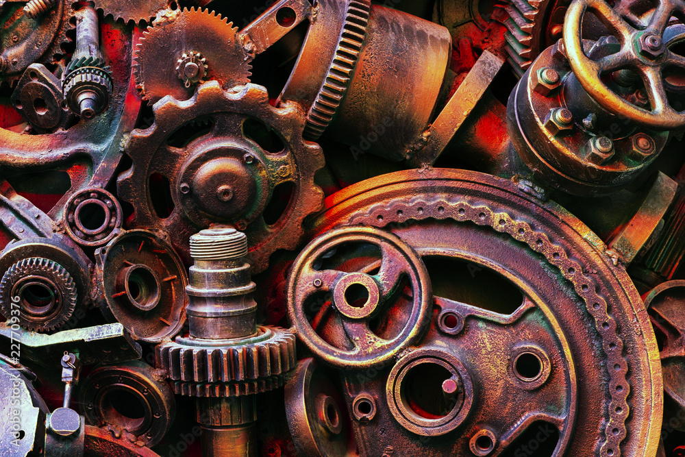 Steampunk background, machine parts, large gears and chains from machines and tractors. Steampunk background, machine parts, large gears and chains from machines and tractors.
