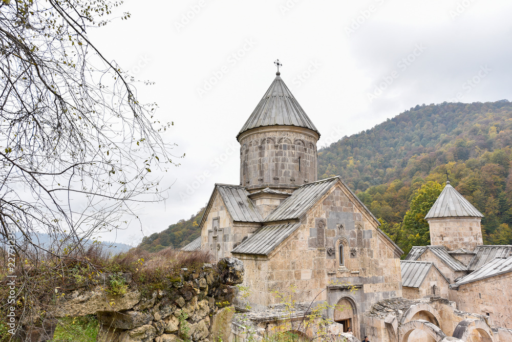 Beautiful Armenian monastery Haghartsin in the autumn forest. Beautiful Armenian monastery Haghartsin in the autumn forest.