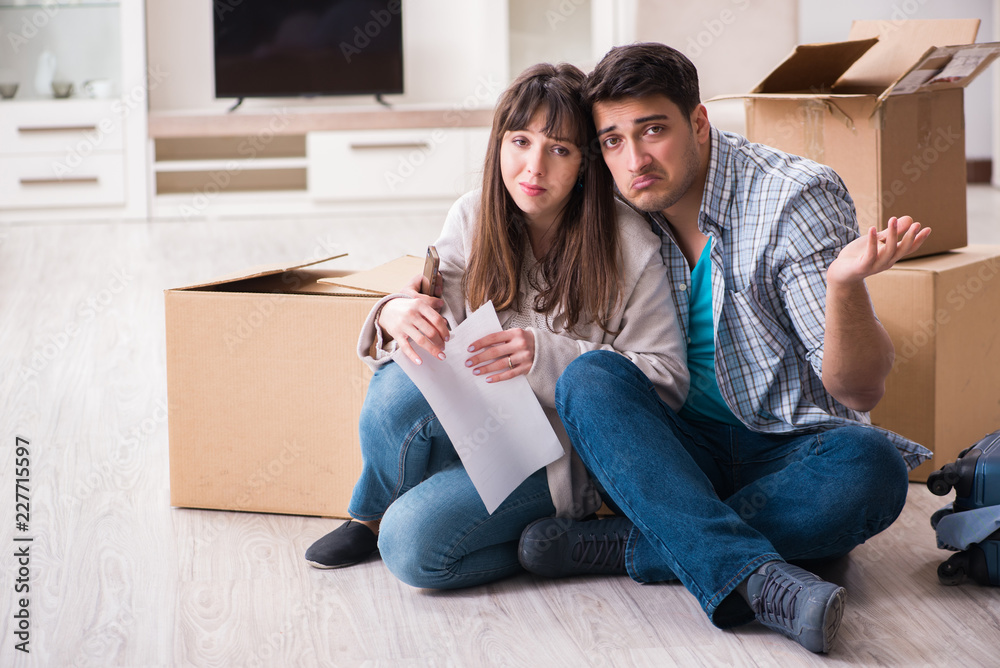 Young couple receiving foreclosure notice letter Young couple receiving foreclosure notice letter