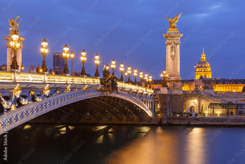 Beautiful view of Seine, Les Invalides and Pont Alexandre III in Paris, France, view from the Passerelle Solferino