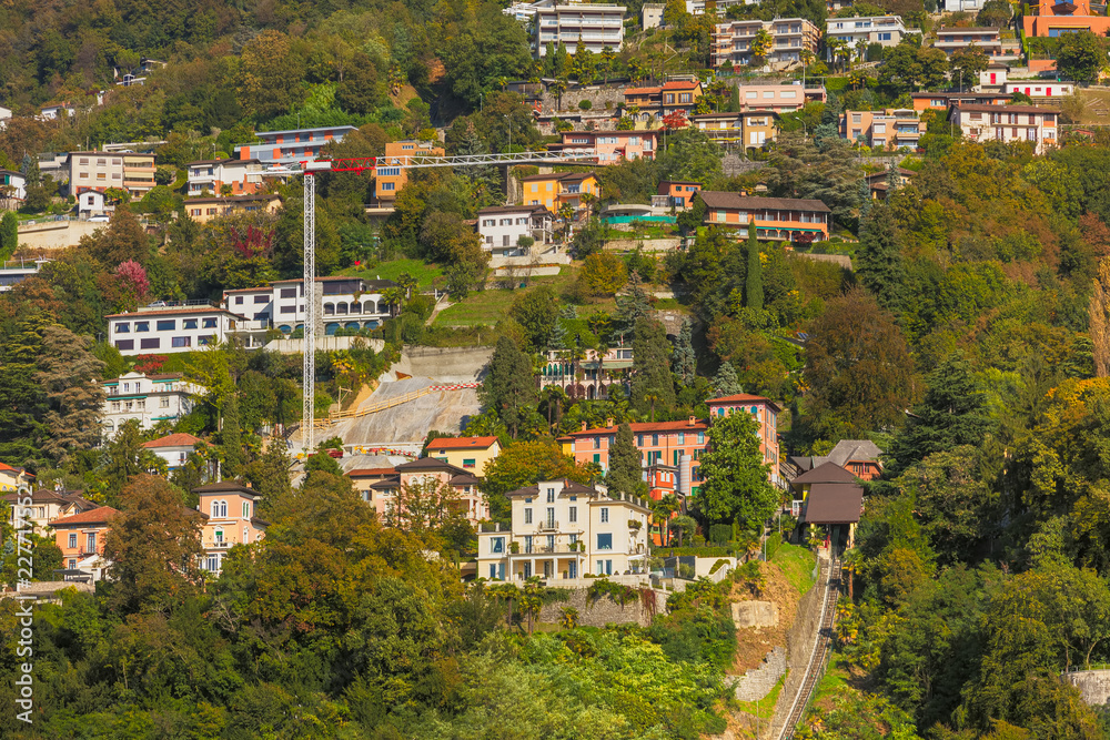 Buildings on the foot of the Monte Bre mountain in Switzerland, view from the city of Lugano