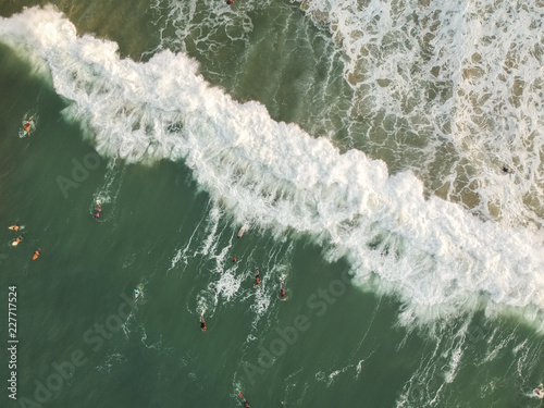 Aerial view of waves with people surfing, Surf. Drone Photography