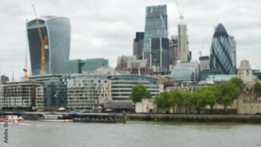 Blurred shot of modern office buildings along River Thames in London Blurred shot of modern office buildings along River Thames in London