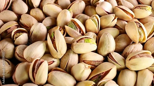 Pistachios. Pistachio texture. Nuts. Green fresh pistachios as texture. Roasted salted pistachios