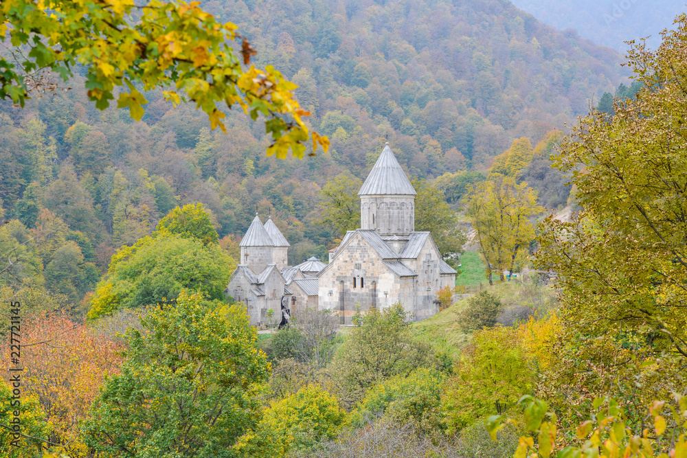 Fototapeta premium Beautiful Armenian monastery Haghartsin in the autumn forest.