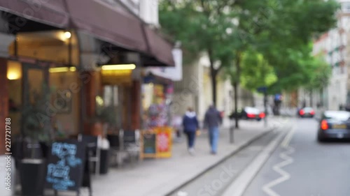 Blurred shot of London city street with charming storefronts 