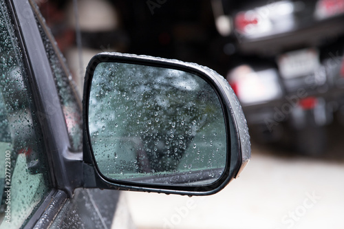 Raindrops on Car Mirror © AnyoneCanPhotography