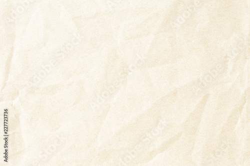 Crumpled old brown background paper texture