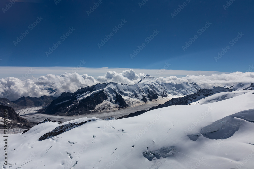 view of the glacier from the peak of the swiss alps