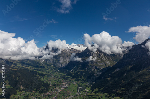 view of the valley from the peak of the swiss alps