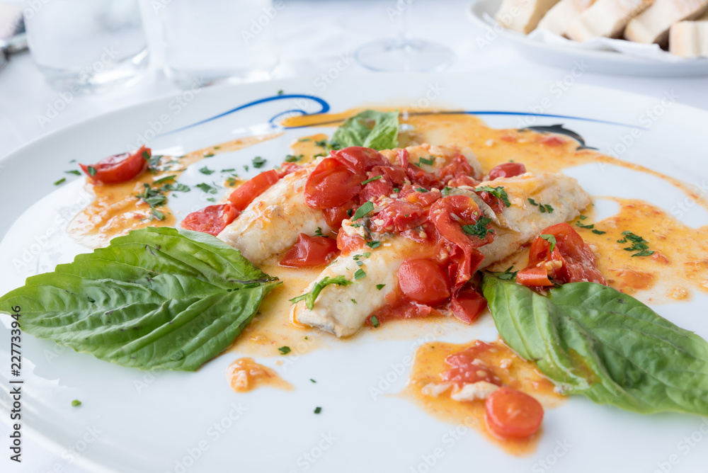 Cod with tomato and basil