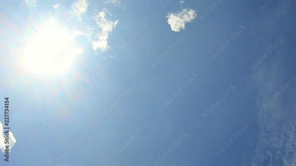 time lapse of Beautiful white clouds ,clouds and sunshine and blue sky  , Video footage .