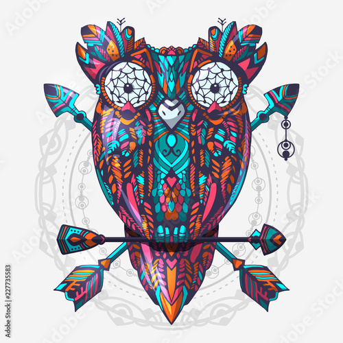 Boho style colored owl with tribal arrows. Hand drawn style vector illustration. Bohemian tribal owl with a dream catcher. Totem owl