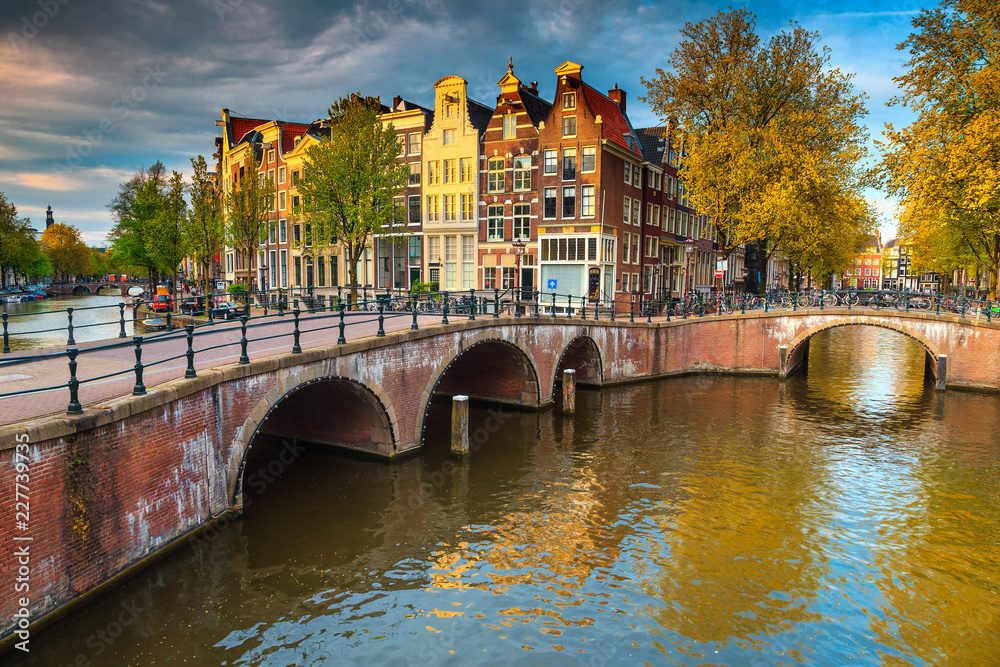Spectacular water canals with bridges and colorful houses, Amsterdam, Netherlands