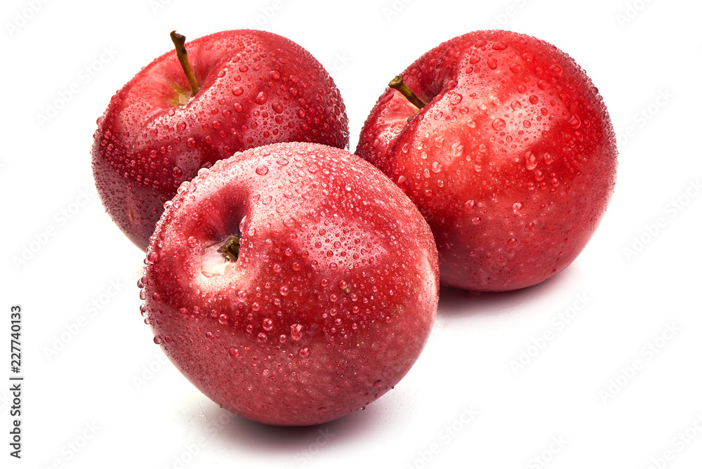 Shiny Red ripe apples with water drops, isolated on white background. Fresh raw organic fruits. Close-up. Shiny Red ripe apples with water drops, isolated on white background. Fresh raw organic fruits. Close-up.
